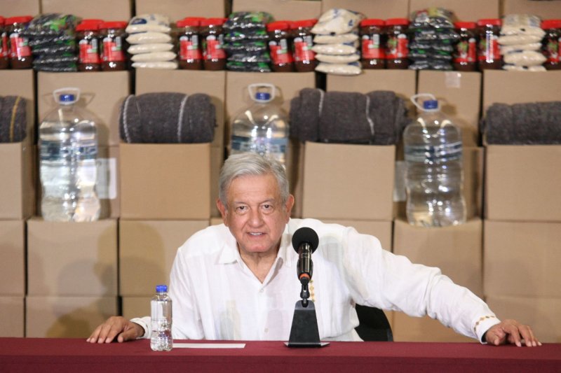 “No me voy a mojar por tomarme la foto”: AMLO