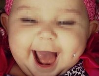 Sorprende en las redes foto de bebé con un piercing en la mejilla; mamá lo presume